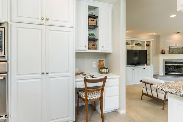 2320 Mountain Ave, La Crescenta, CA 91214 - kitchen with white cabinets, open shelves, recessed lighting, open floor plan, and light stone counters