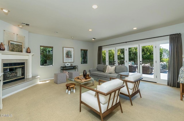 2320 Mountain Ave, La Crescenta, CA 91214 - living area with light colored carpet, healthy amount of natural light, a fireplace, and recessed lighting