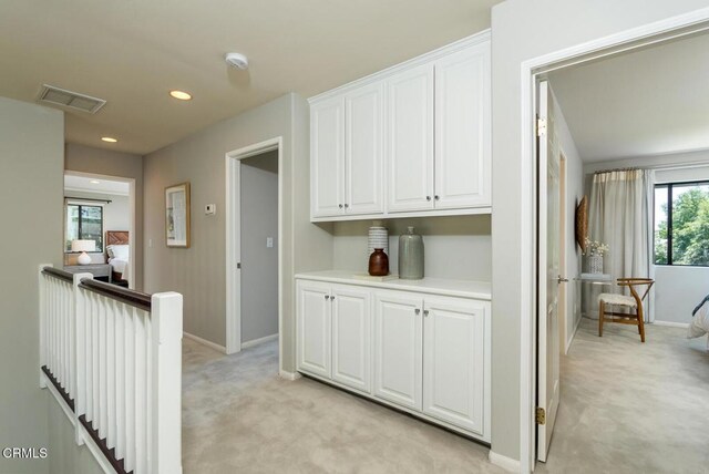 2320 Mountain Ave, La Crescenta, CA 91214 - corridor with light colored carpet, baseboards, an upstairs landing, and recessed lighting
