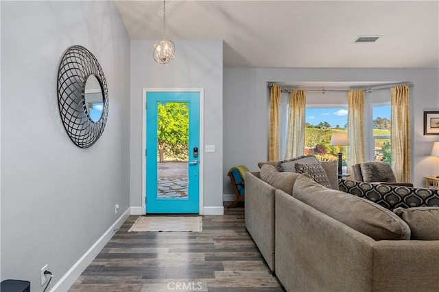 2750 Lazy Hill Rd, San Miguel, CA 93451 - entrance foyer with wood finished floors, baseboards, and a chandelier