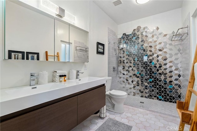 2750 Lazy Hill Rd, San Miguel, CA 93451 - bathroom featuring tiled shower, toilet, tile patterned floors, and vanity