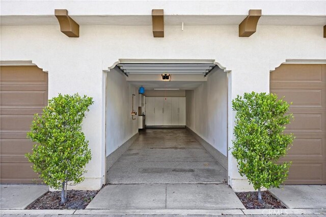 405 Mallorca Ln, Brea, CA 92823 - property entrance featuring stucco siding and a garage