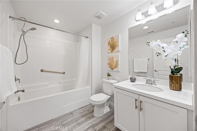 405 Mallorca Ln, Brea, CA 92823 - full bath with toilet, shower / bath combination with curtain, vanity, wood finished floors, and recessed lighting