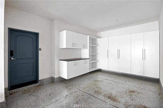 405 Mallorca Ln, Brea, CA 92823 - garage featuring baseboards
