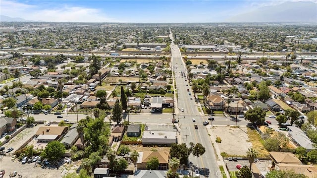 673 W 9th St, San Bernardino, CA 92410 - aerial overview of property's location with nearby suburban area