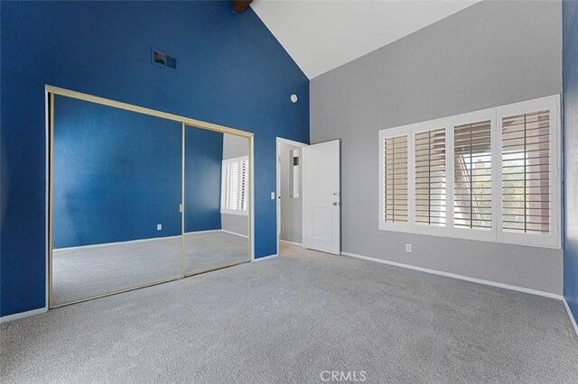 16227 Glencove Dr, Hacienda Heights, CA 91745 - unfurnished bedroom featuring high vaulted ceiling, carpet flooring, baseboards, and a closet