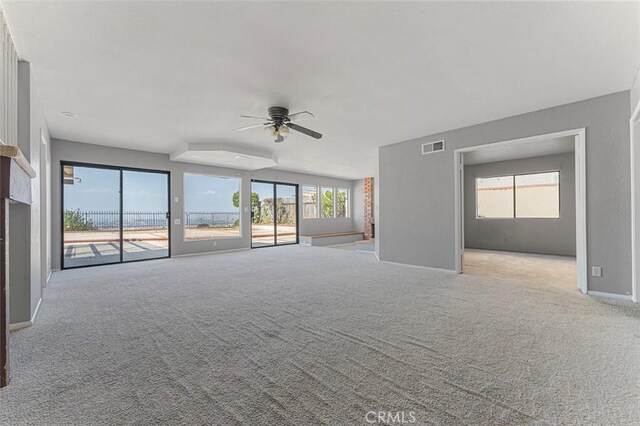 16227 Glencove Dr, Hacienda Heights, CA 91745 - unfurnished living room with ceiling fan, healthy amount of natural light, carpet floors, and baseboards