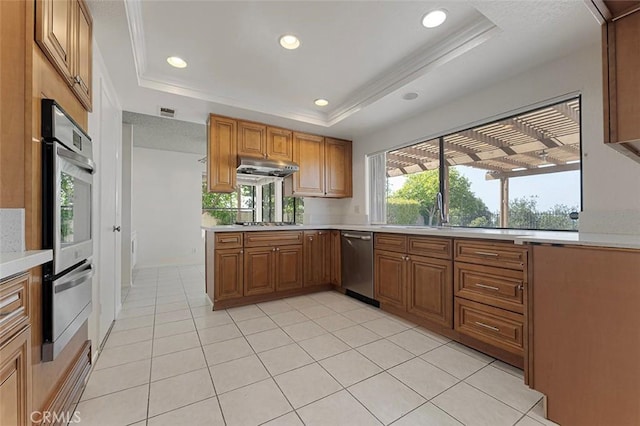 16227 Glencove Dr, Hacienda Heights, CA 91745 - kitchen with appliances with stainless steel finishes, light countertops, a raised ceiling, a warming drawer, and recessed lighting