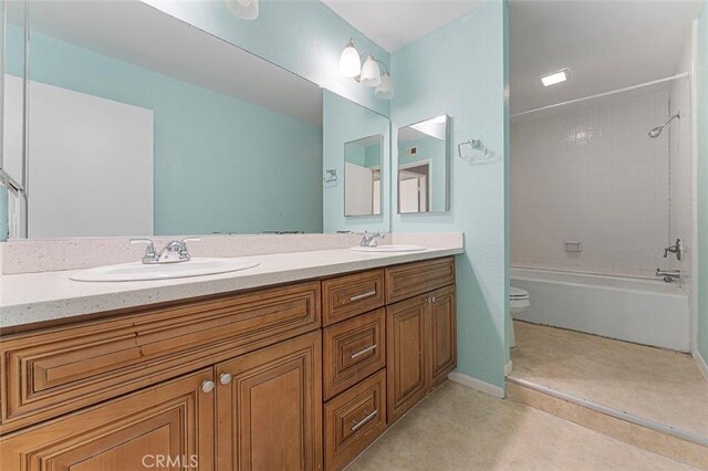 16227 Glencove Dr, Hacienda Heights, CA 91745 - bathroom with double vanity, toilet, and bathing tub / shower combination