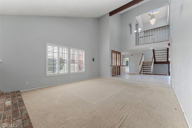 16227 Glencove Dr, Hacienda Heights, CA 91745 - unfurnished living room featuring stairway, carpet flooring, a chandelier, high vaulted ceiling, and baseboards