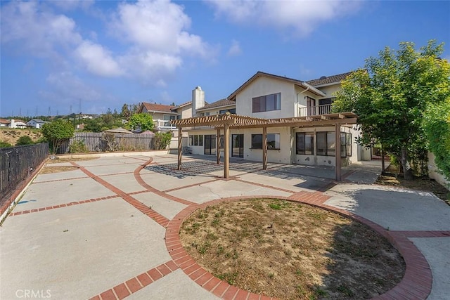 16227 Glencove Dr, Hacienda Heights, CA 91745 - back of property with a pergola, stucco siding, a patio area, and a fenced backyard