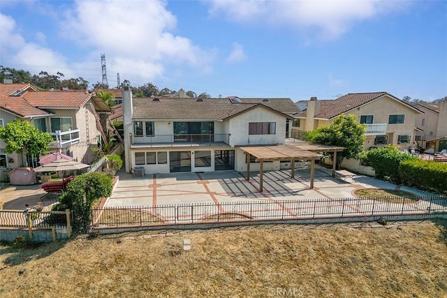 16227 Glencove Dr, Hacienda Heights, CA 91745 - rear view of property with a patio, a fenced backyard, stucco siding, a residential view, and a chimney