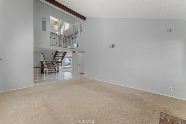 16227 Glencove Dr, Hacienda Heights, CA 91745 - unfurnished living room featuring stairs, a chandelier, carpet flooring, beam ceiling, and high vaulted ceiling