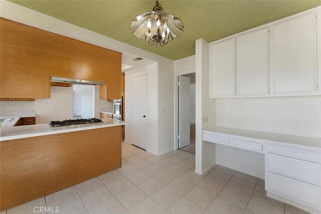 16227 Glencove Dr, Hacienda Heights, CA 91745 - kitchen with stainless steel appliances, light countertops, light tile patterned floors, white cabinetry, and ventilation hood