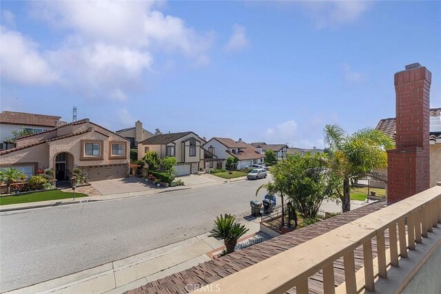 16227 Glencove Dr, Hacienda Heights, CA 91745 - view of asphalt street featuring sidewalks, curbs, and a residential view