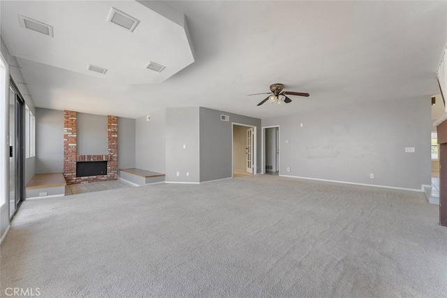 16227 Glencove Dr, Hacienda Heights, CA 91745 - unfurnished living room featuring a brick fireplace, a ceiling fan, light carpet, and baseboards