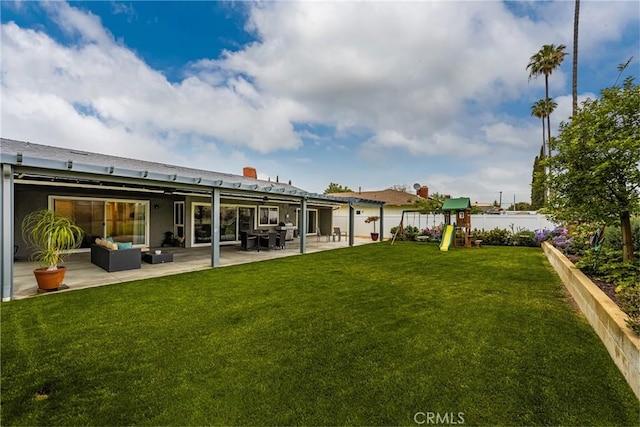1624 Kingston Rd, Placentia, CA 92870 - back of house with an outdoor hangout area, a playground, and a patio