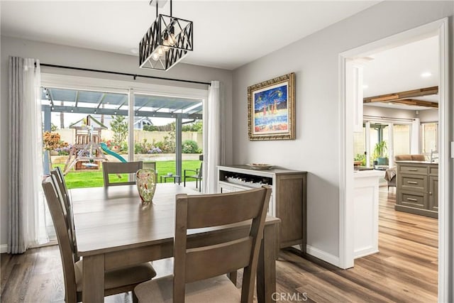 1624 Kingston Rd, Placentia, CA 92870 - dining space with wood finished floors, baseboards, and a chandelier