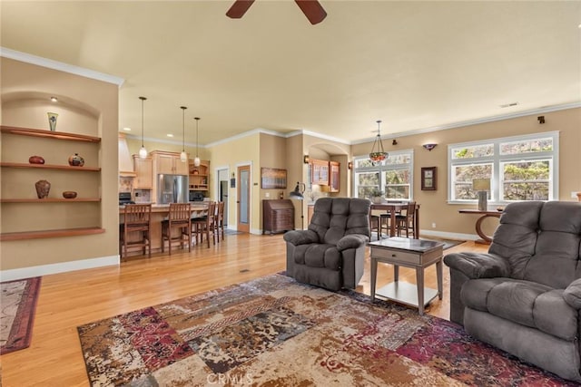 5 Sycamore Valley Rd, Chico, CA 95973 - living area featuring light wood-style floors, ceiling fan, crown molding, and baseboards