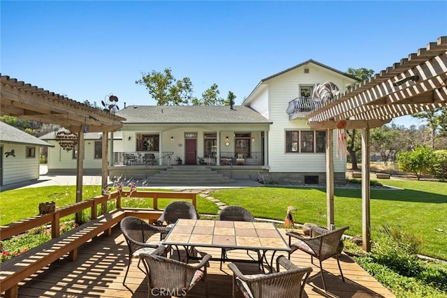 5 Sycamore Valley Rd, Chico, CA 95973 - rear view of property featuring a pergola, outdoor dining area, and a lawn