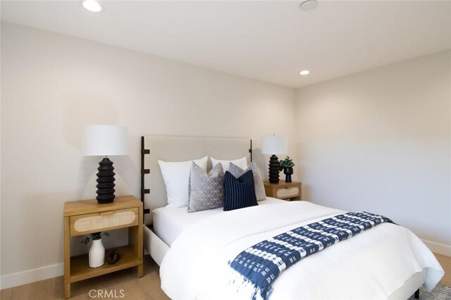 12312 Eveningside Dr, Santa Ana, CA 92705 - bedroom featuring baseboards, recessed lighting, and wood finished floors