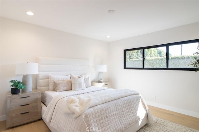 12312 Eveningside Dr, Santa Ana, CA 92705 - bedroom featuring light wood-style floors, baseboards, and recessed lighting