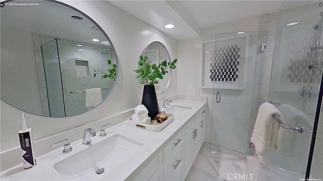 12312 Eveningside Dr, Santa Ana, CA 92705 - full bath with marble finish floors, a stall shower, recessed lighting, and double vanity