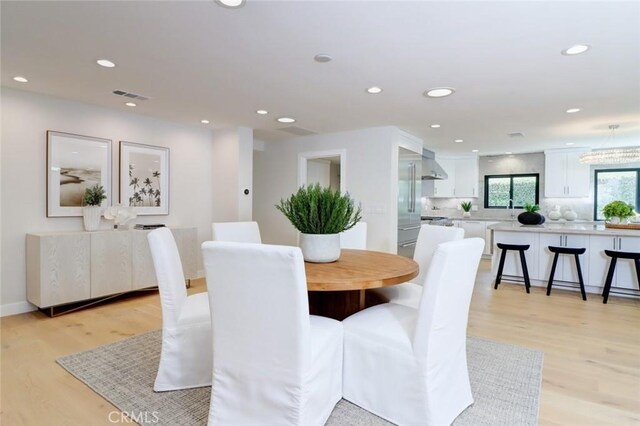 12312 Eveningside Dr, Santa Ana, CA 92705 - dining space featuring light wood-type flooring and recessed lighting