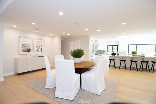 12312 Eveningside Dr, Santa Ana, CA 92705 - dining area with recessed lighting, light wood finished floors, and baseboards