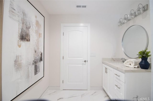12312 Eveningside Dr, Santa Ana, CA 92705 - bathroom featuring vanity and marble look tile flooring