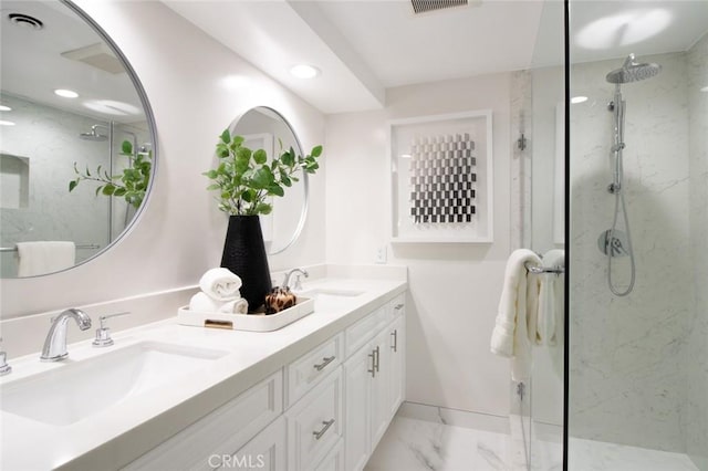12312 Eveningside Dr, Santa Ana, CA 92705 - bathroom featuring a marble finish shower, marble finish floors, double vanity, recessed lighting, and baseboards