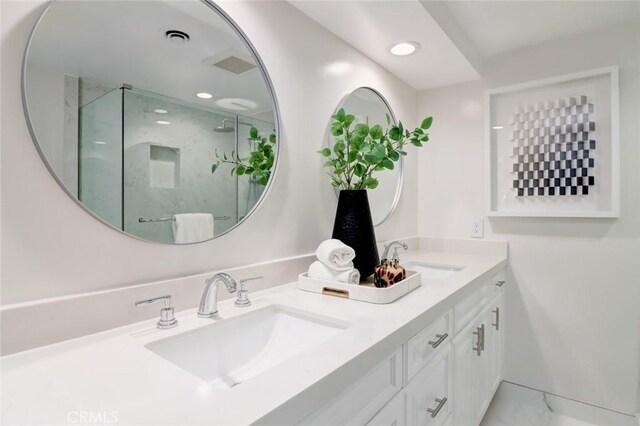 12312 Eveningside Dr, Santa Ana, CA 92705 - full bathroom with a marble finish shower, double vanity, and recessed lighting