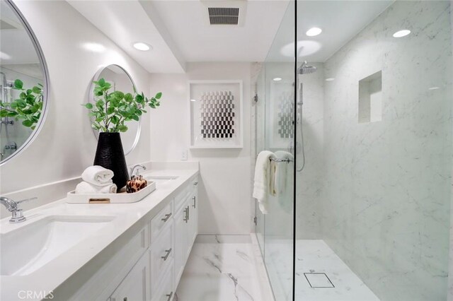 12312 Eveningside Dr, Santa Ana, CA 92705 - full bathroom with marble finish flooring, a marble finish shower, recessed lighting, and double vanity