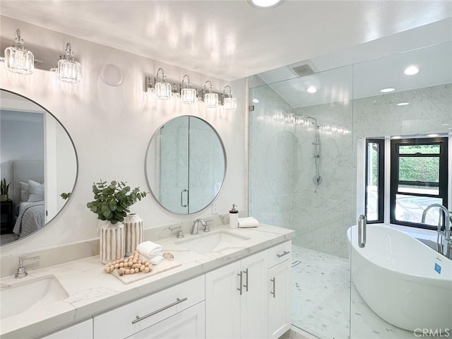 12312 Eveningside Dr, Santa Ana, CA 92705 - full bathroom featuring a stall shower, a soaking tub, double vanity, and connected bathroom