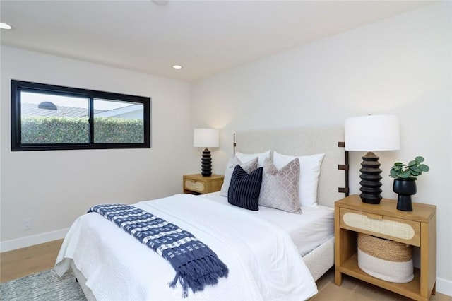 12312 Eveningside Dr, Santa Ana, CA 92705 - bedroom with wood finished floors, baseboards, and recessed lighting