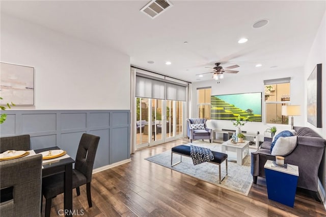 2974 E Walking Beam Pl, Brea, CA 92821 - living area featuring ceiling fan, recessed lighting, wood finished floors, and a decorative wall