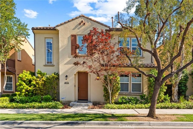 2974 E Walking Beam Pl, Brea, CA 92821 - mediterranean / spanish home with a tiled roof and stucco siding