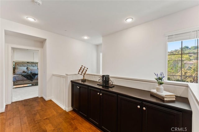 2974 E Walking Beam Pl, Brea, CA 92821 - bar area featuring dark wood-style flooring, recessed lighting, and baseboards