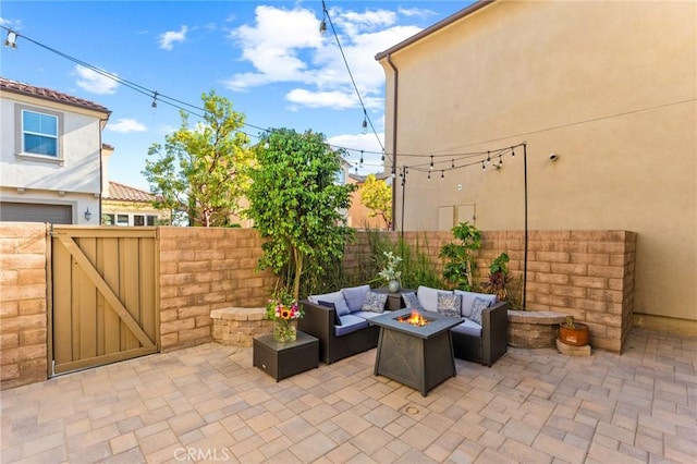 2974 E Walking Beam Pl, Brea, CA 92821 - view of patio / terrace featuring an outdoor living space with a fire pit and a gate