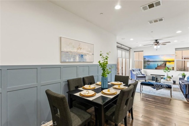 2974 E Walking Beam Pl, Brea, CA 92821 - dining room featuring a decorative wall, wood finished floors, recessed lighting, ceiling fan, and a wainscoted wall