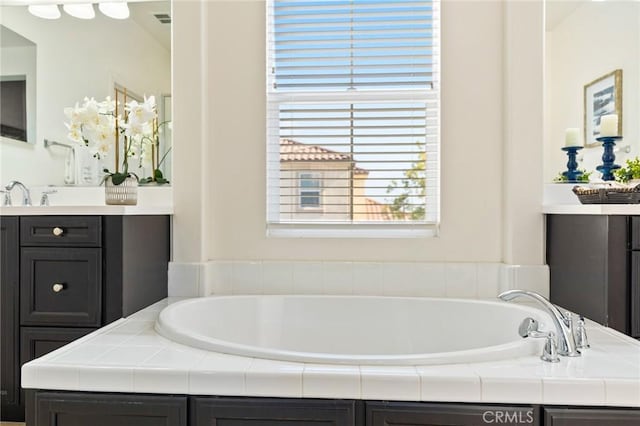 2974 E Walking Beam Pl, Brea, CA 92821 - bathroom featuring a garden tub and vanity