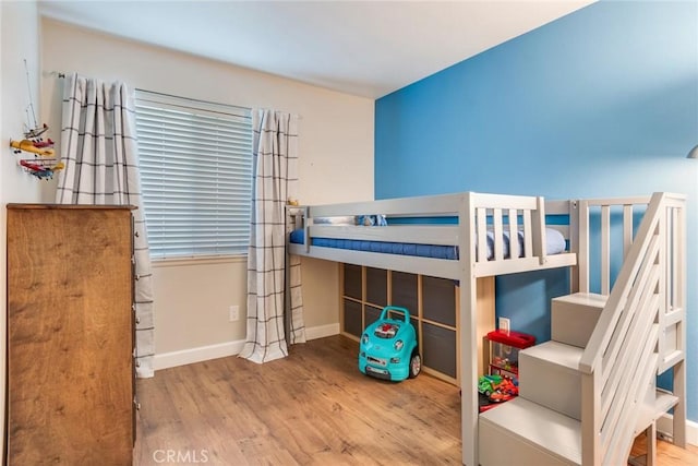 2637 Alder Creek Dr, Ontario, CA 91761 - bedroom with wood finished floors and baseboards
