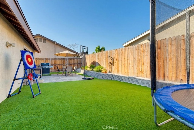 2637 Alder Creek Dr, Ontario, CA 91761 - view of yard with a trampoline and a patio area
