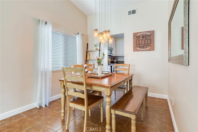 2637 Alder Creek Dr, Ontario, CA 91761 - dining space featuring light tile patterned floors, baseboards, and a chandelier