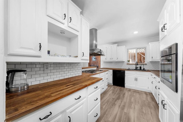 3117 Cherimoya St, Jamul, CA 91935 - kitchen featuring butcher block countertops, appliances with stainless steel finishes, island exhaust hood, a sink, and backsplash