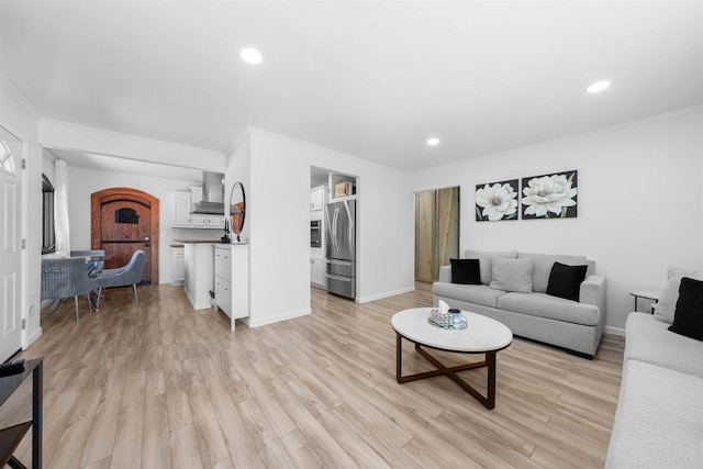 3117 Cherimoya St, Jamul, CA 91935 - living room featuring light wood-style flooring, ornamental molding, recessed lighting, and baseboards
