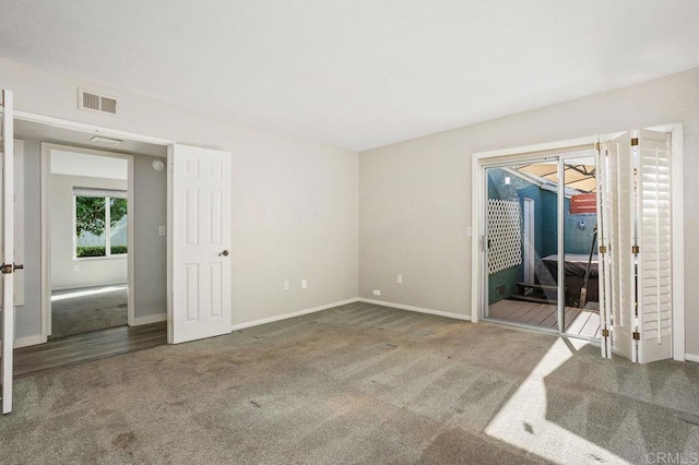 6804 Urubu St, Carlsbad, CA 92009 - spare room with carpet flooring and baseboards