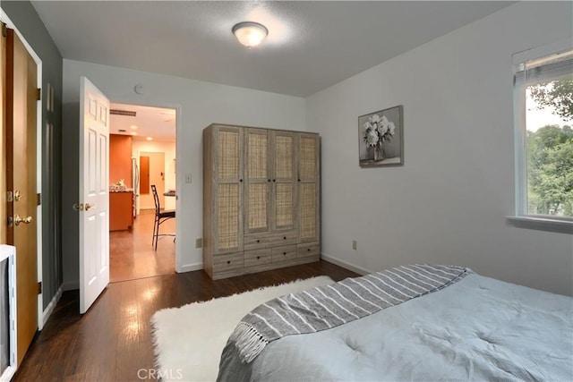 51864 Mountain Quail Pl, Oakhurst, CA 93644 - bedroom with wood finished floors and baseboards