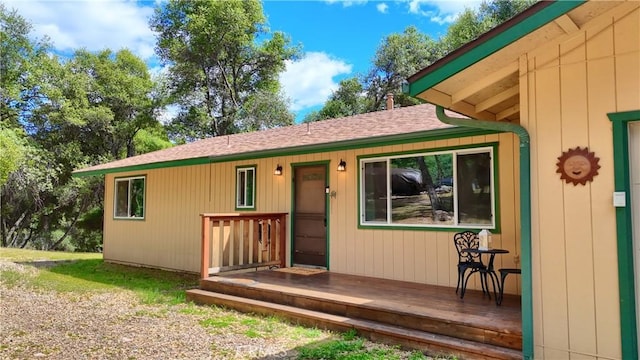 51864 Mountain Quail Pl, Oakhurst, CA 93644 - back of house featuring a shingled roof