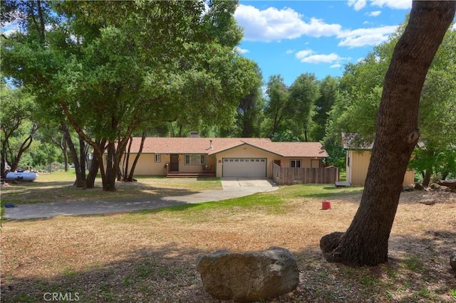 51864 Mountain Quail Pl, Oakhurst, CA 93644 - ranch-style home featuring driveway and a garage